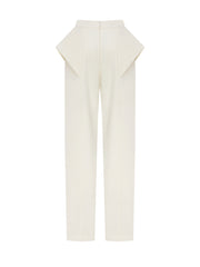 Pants with wing-shaped elements