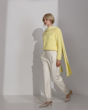 Pants with wing-shaped elements