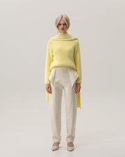 Pants with wing-shaped elements