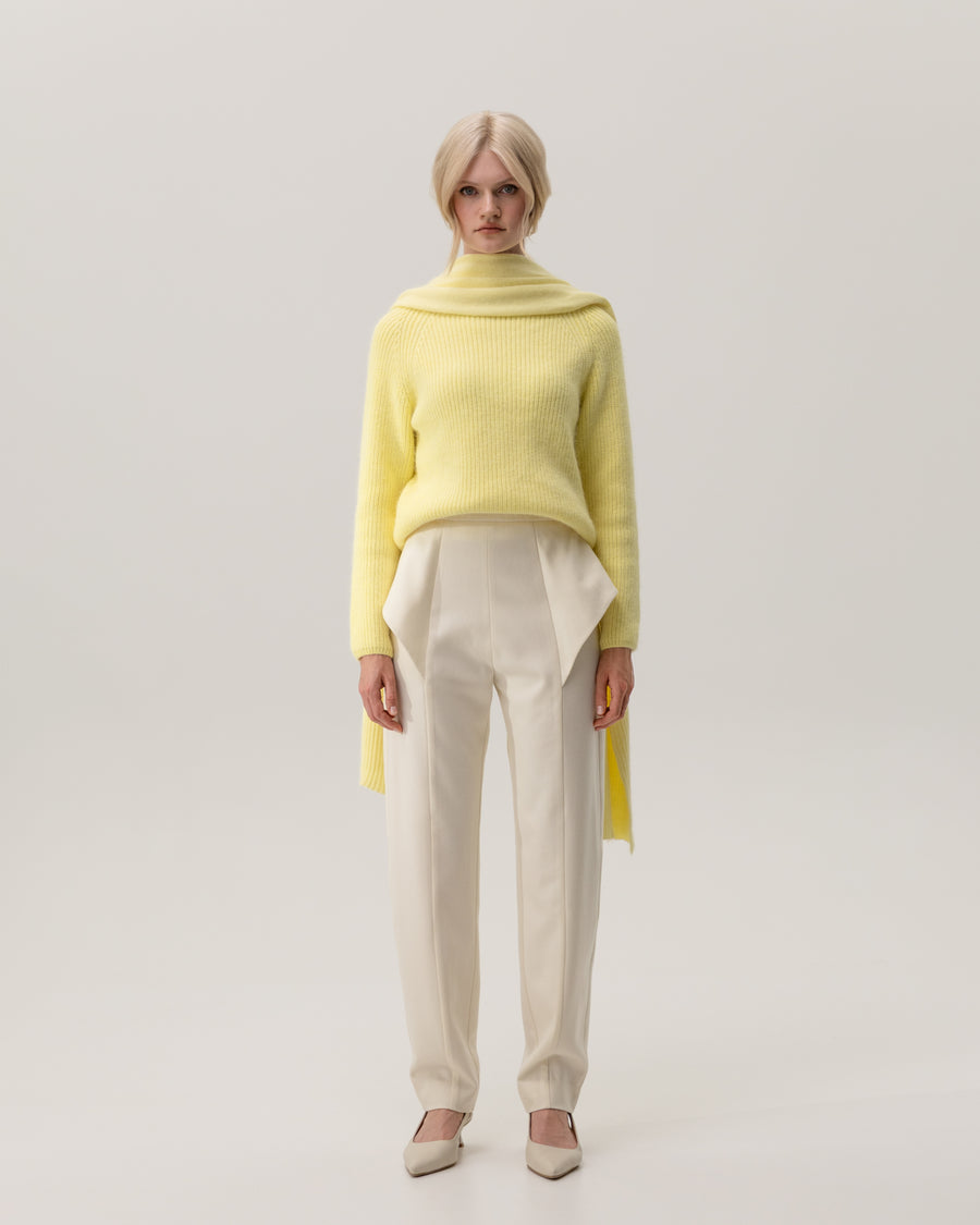 Pants with wing-shaped elements